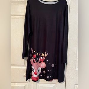 A Christmas dress with Rudolph the red nose reindeer on it.